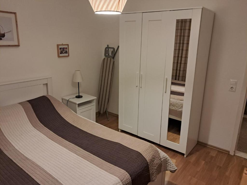 Postel nebo postele na pokoji v ubytování Apartments Trstenica