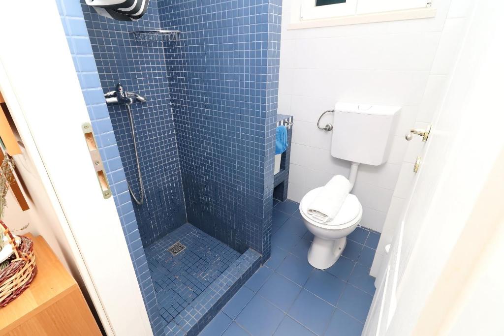 Koupelna v ubytování Apartments Trstenica