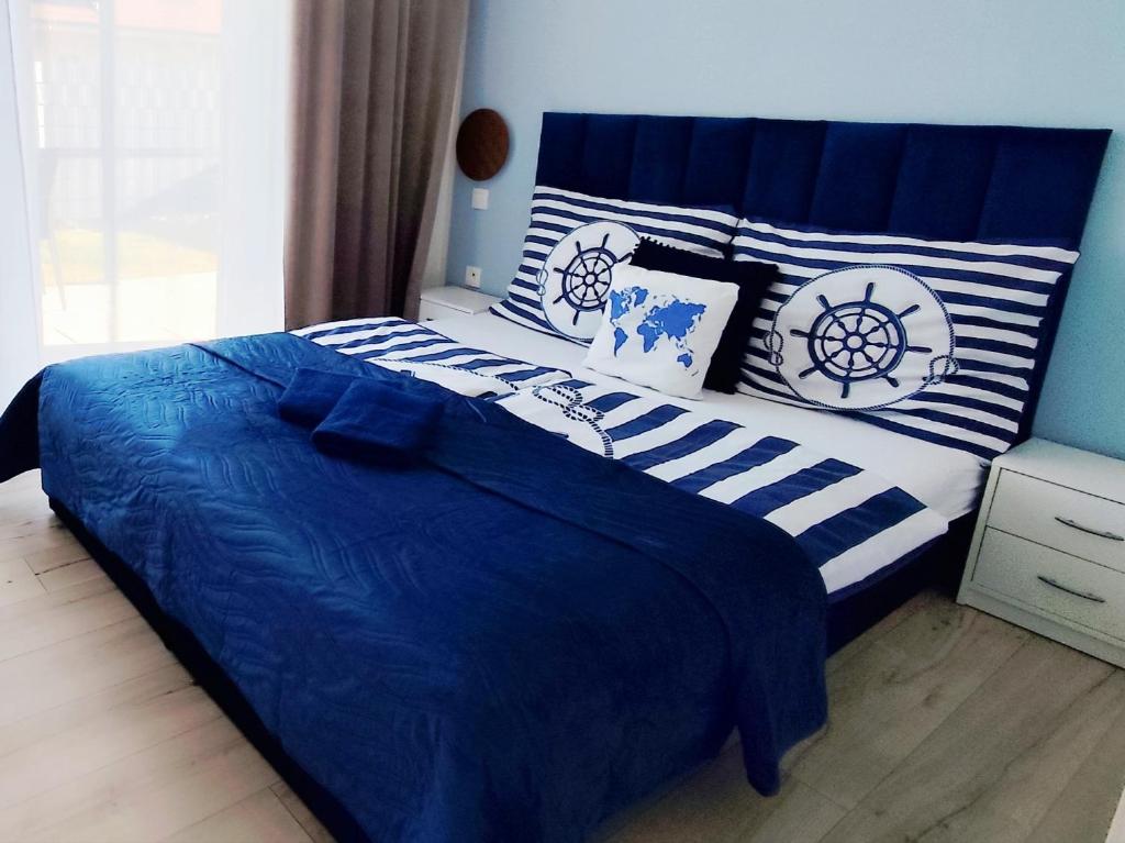 Postel nebo postele na pokoji v ubytování Ahoy Relax Apartmany Nesvady