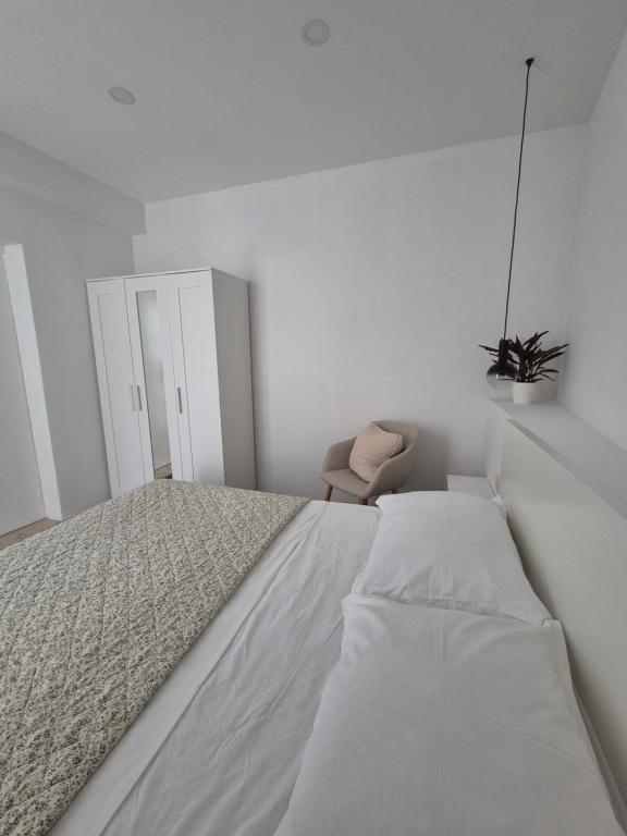 Postel nebo postele na pokoji v ubytování La La Lalic house