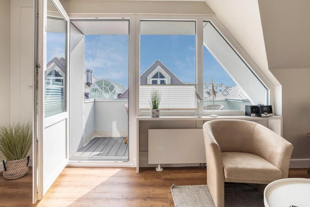 Posezení v ubytování Hochwertig möblierte 2-Zimmer-Wohnung mit Balkon