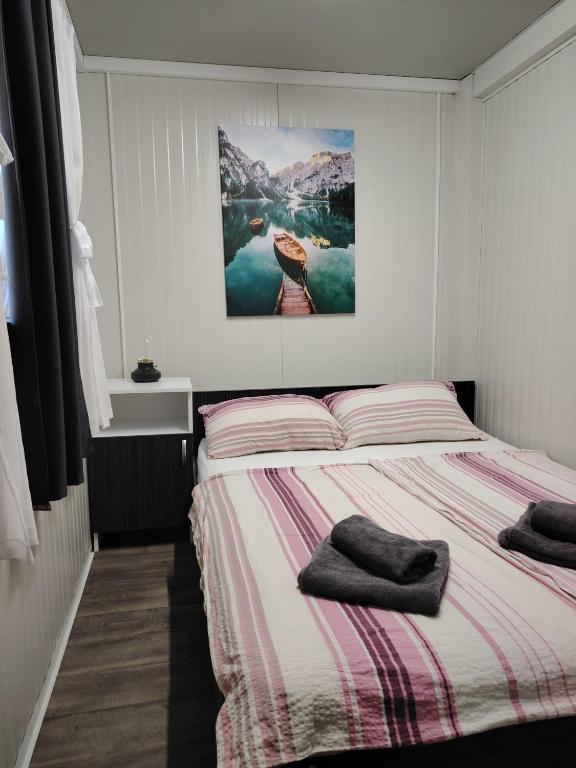Postel nebo postele na pokoji v ubytování Mobile home Amfora