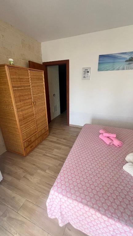 Postel nebo postele na pokoji v ubytování Salento Villa Don Peppino
