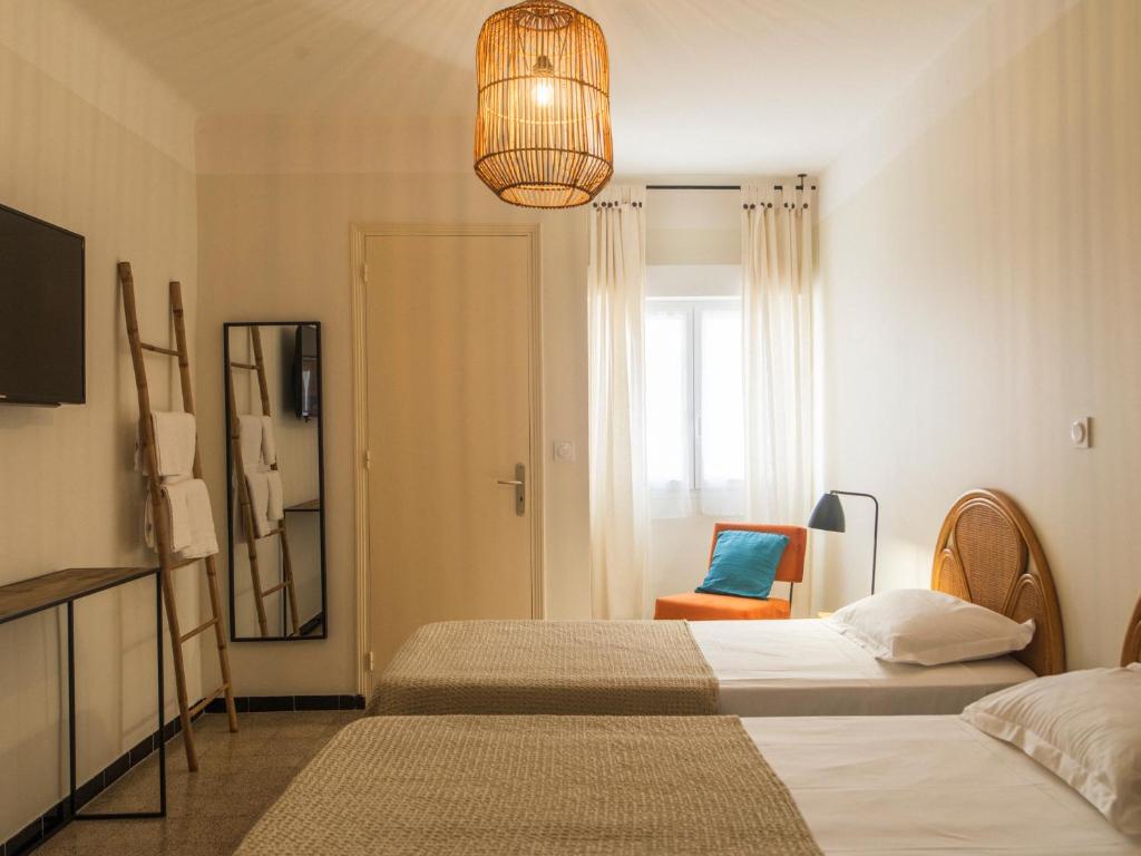 Postel nebo postele na pokoji v ubytování Casa Orfea