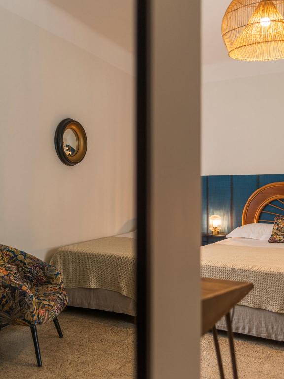 Postel nebo postele na pokoji v ubytování Casa Orfea