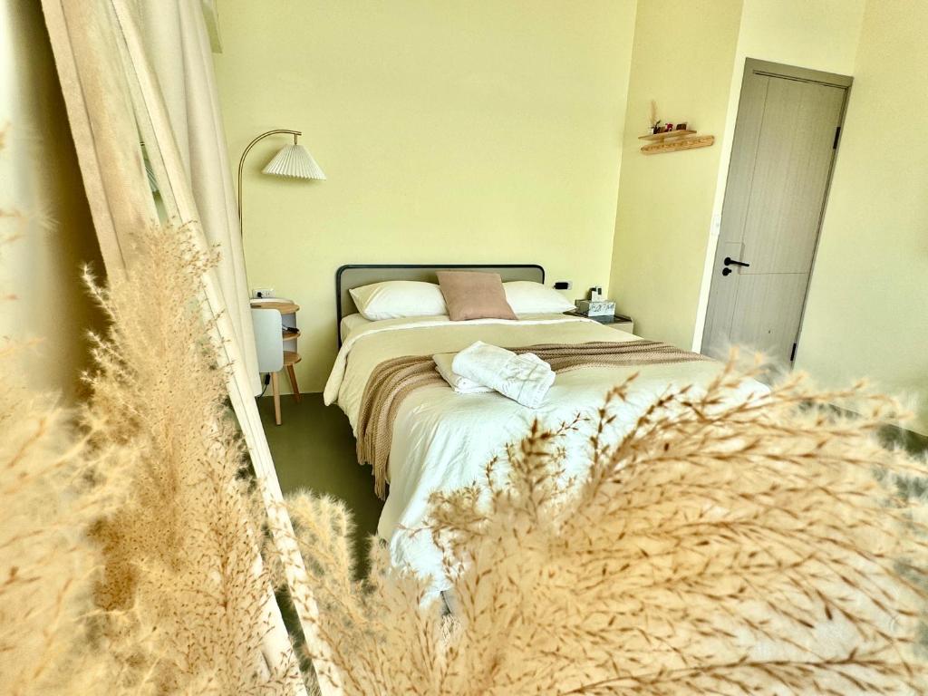 Postel nebo postele na pokoji v ubytování 南灣薇拉海景莊園 包棟Villa
