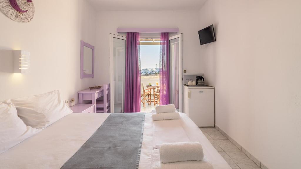 Postel nebo postele na pokoji v ubytování Agnanti View Hotel