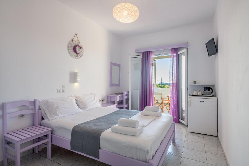 Postel nebo postele na pokoji v ubytování Agnanti View Hotel