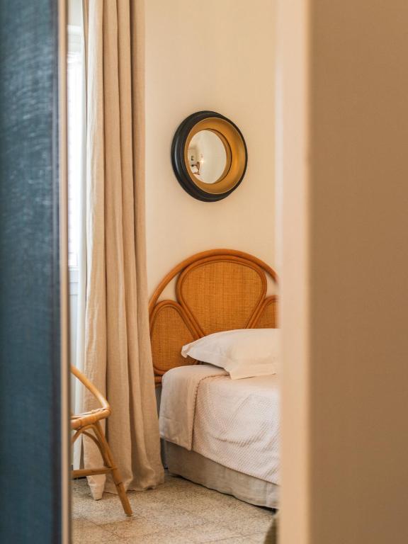 Postel nebo postele na pokoji v ubytování Casa Orfea