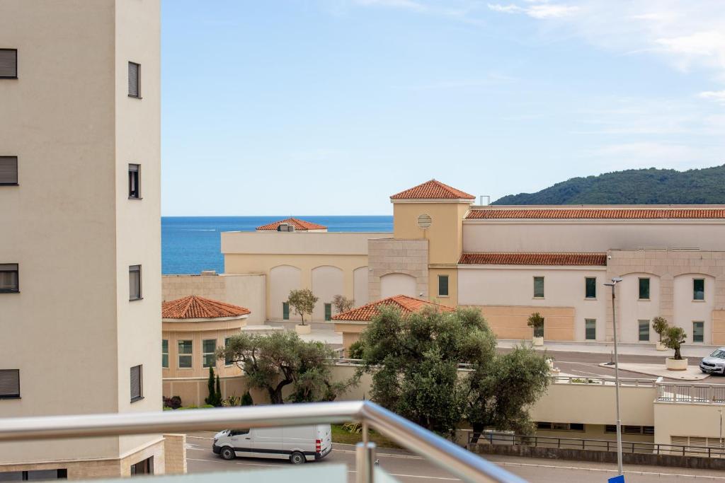 a view from the balcony of a building at Apartmani Becici in Bečići