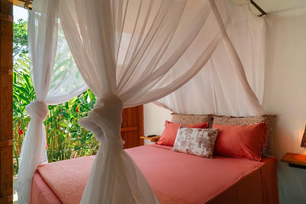 Cama ou camas em um quarto em Casa Canoa - Praia de Algodões