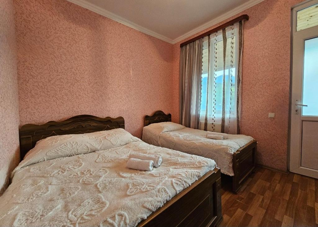 Postel nebo postele na pokoji v ubytování Tsemi Forest ცემი