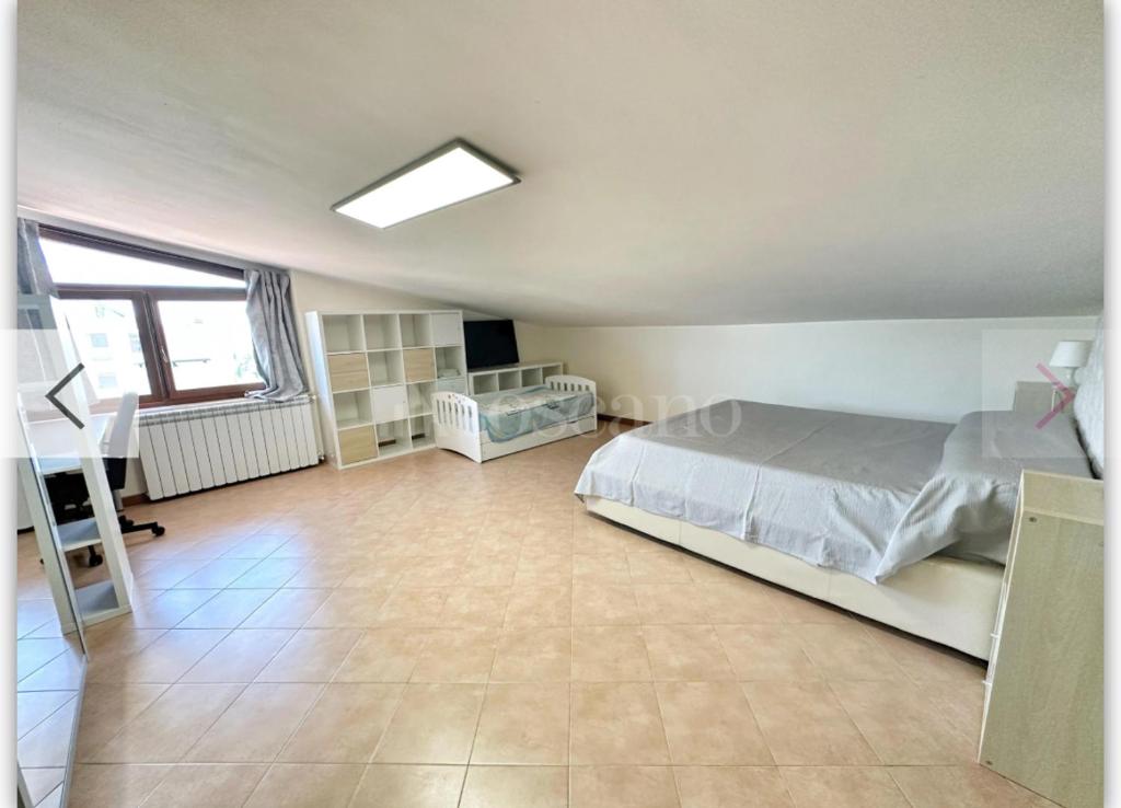 Postel nebo postele na pokoji v ubytování Suite Tania
