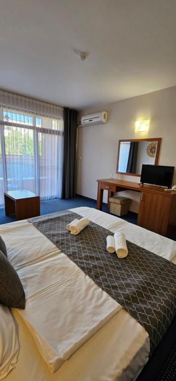 Postel nebo postele na pokoji v ubytování Hotel Liani - All Inclusive
