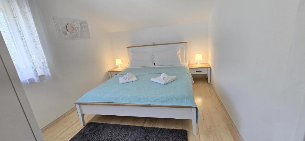Posteľ alebo postele v izbe v ubytovaní Rustic Apartment Mariva