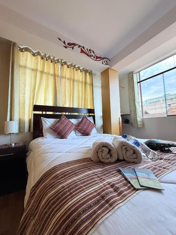 Postel nebo postele na pokoji v ubytování Yanuy Culinary Stay and Taste
