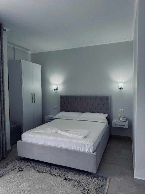 Postel nebo postele na pokoji v ubytování DIELL HOTEL