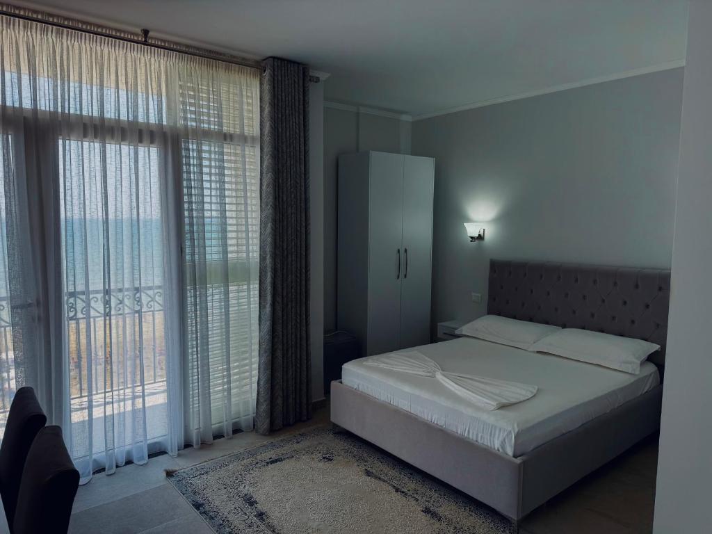 Postel nebo postele na pokoji v ubytování DIELL HOTEL