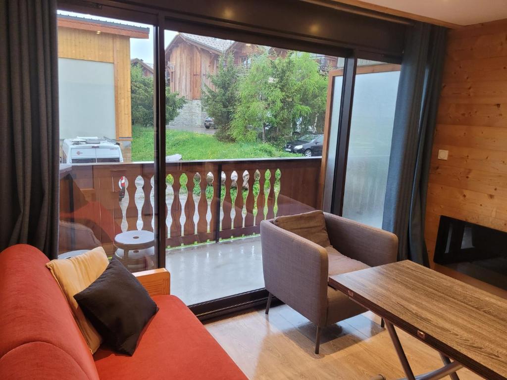 Гостиная зона в Résidence ATHOS C2-1 Chambre-ALPE D'HUEZ-Centre Station