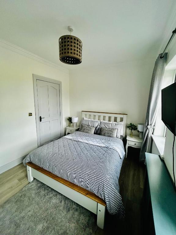 Postel nebo postele na pokoji v ubytování Connemara Ocean Escape