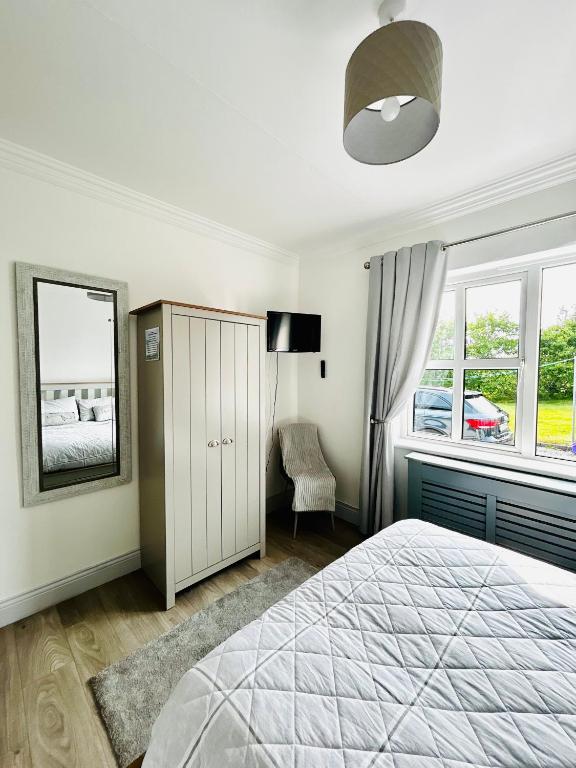 Postel nebo postele na pokoji v ubytování Connemara Ocean Escape