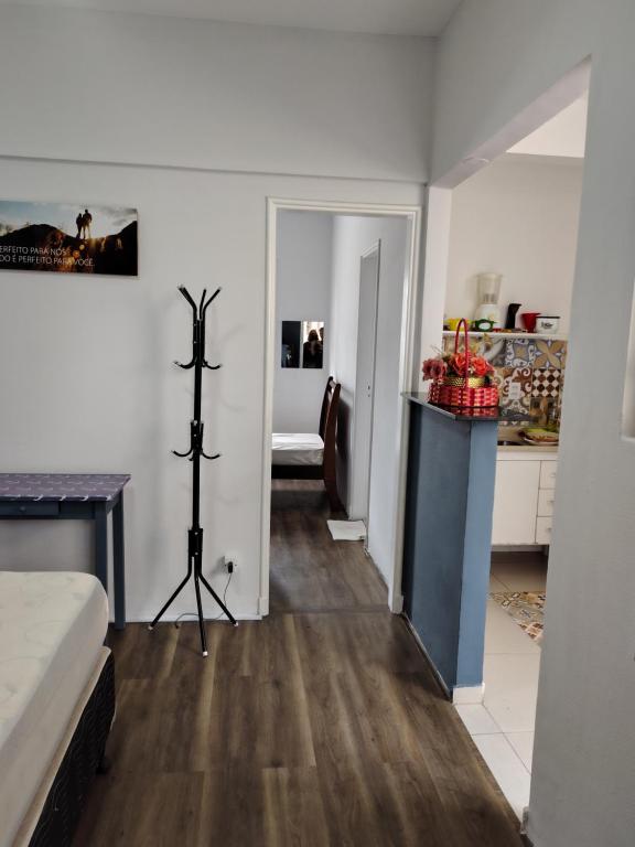 En eller flere senge i et værelse på Apartamento de São Vicente