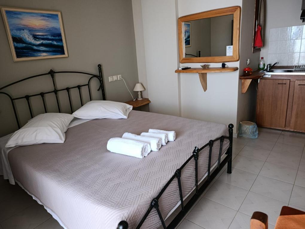 Postel nebo postele na pokoji v ubytování Irida Studios