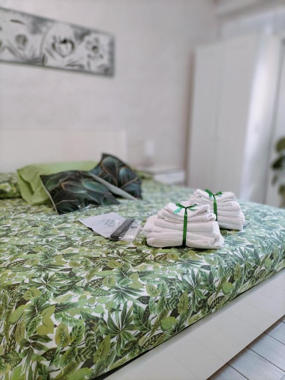 Postel nebo postele na pokoji v ubytování B&B La Palmetta
