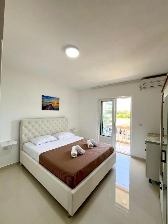 Postel nebo postele na pokoji v ubytování Holiday House