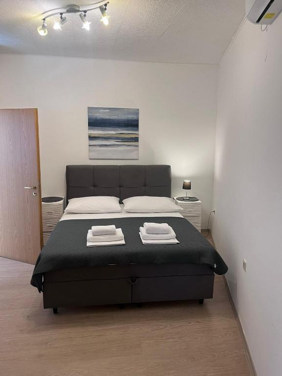 Posteľ alebo postele v izbe v ubytovaní Apartments ATM