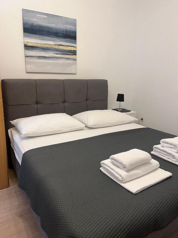 Posteľ alebo postele v izbe v ubytovaní Apartments ATM