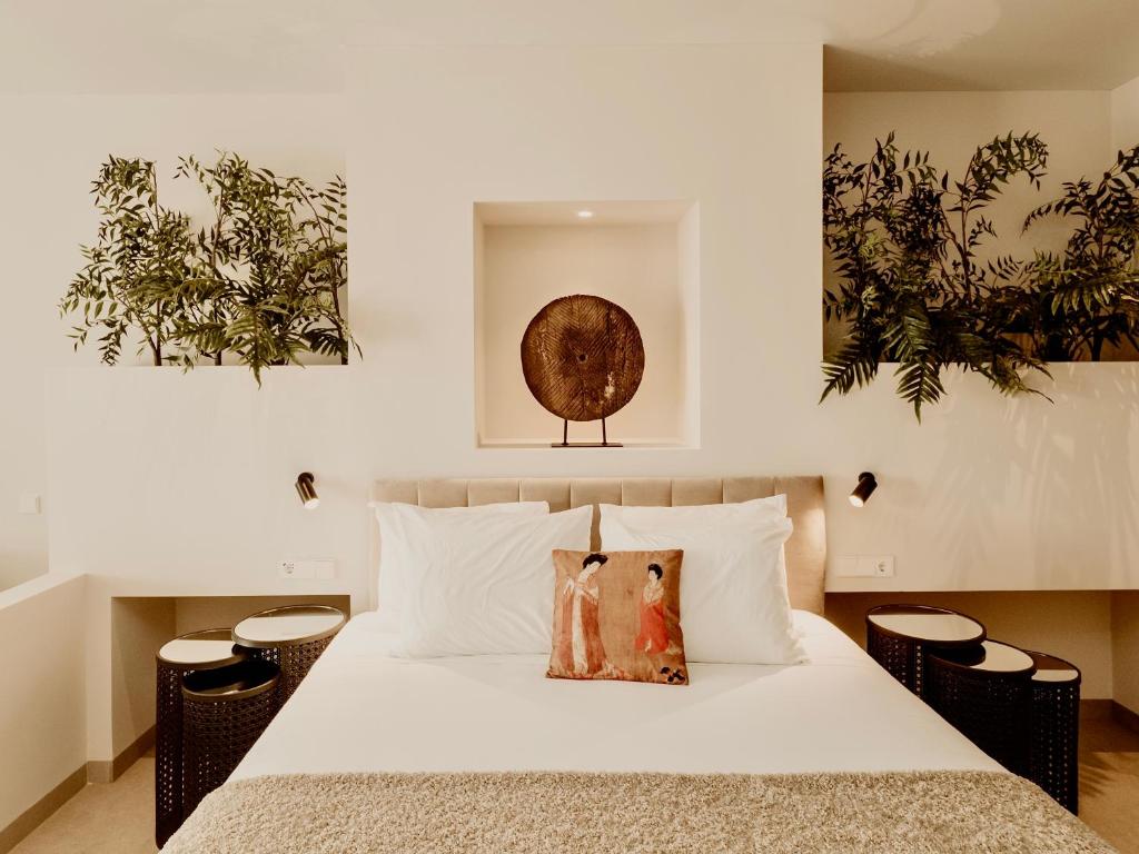 Posteľ alebo postele v izbe v ubytovaní Comfy Studios Hotel