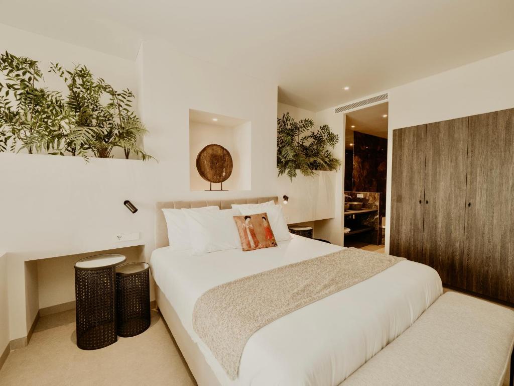 Posteľ alebo postele v izbe v ubytovaní Comfy Studios Hotel