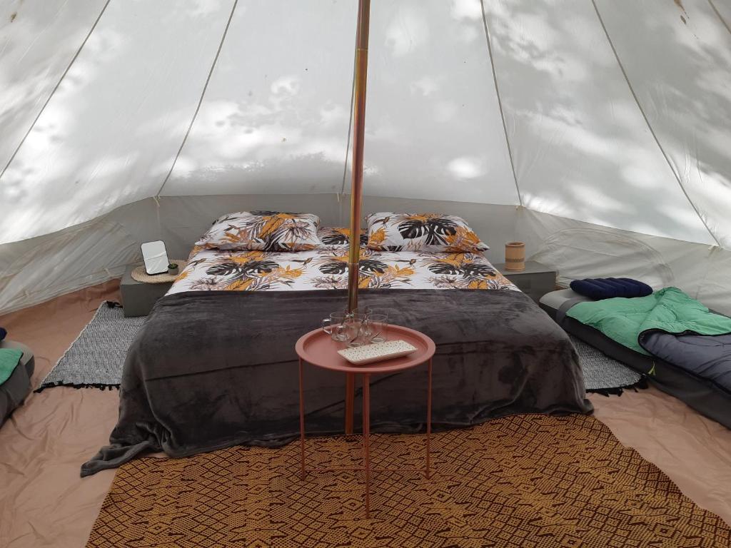 Postel nebo postele na pokoji v ubytování Nalu Glamp
