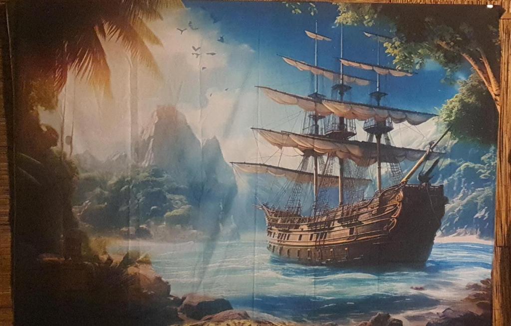 a painting of a ship in the water at Casa Cleopatra 2 MAI in 2 Mai