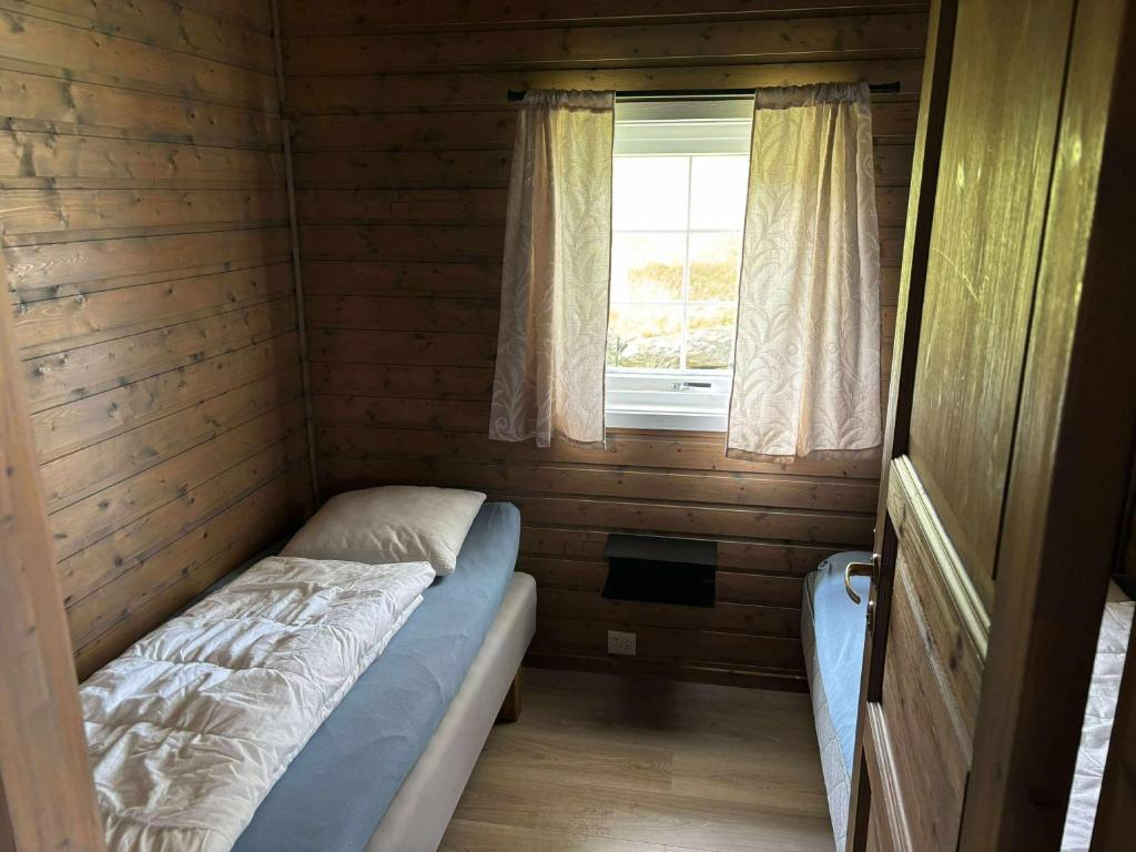Postel nebo postele na pokoji v ubytování Skottneset Feriesenter