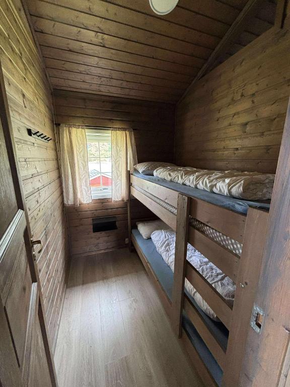 Palanda nebo palandy na pokoji v ubytování Skottneset Feriesenter