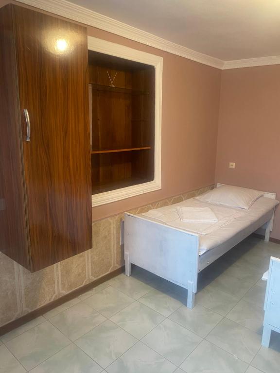 Postel nebo postele na pokoji v ubytování Vakho house
