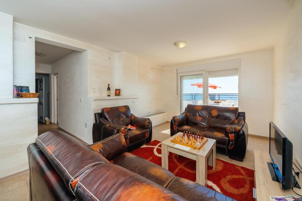 Posezení v ubytování Apart Hotel S Lux