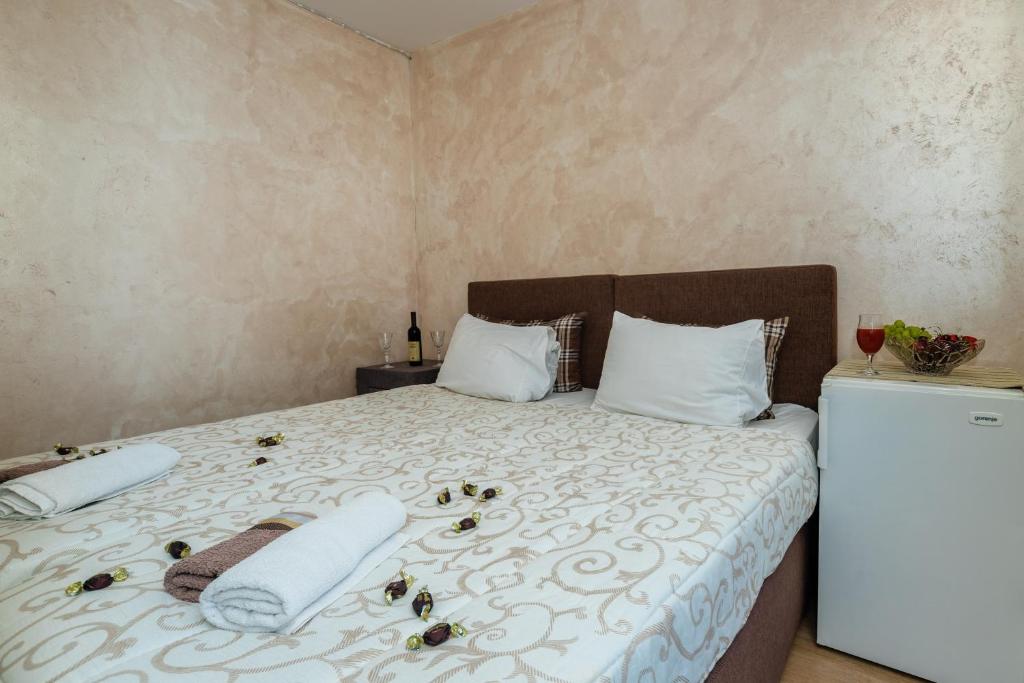 Postel nebo postele na pokoji v ubytování Apart Hotel S Lux