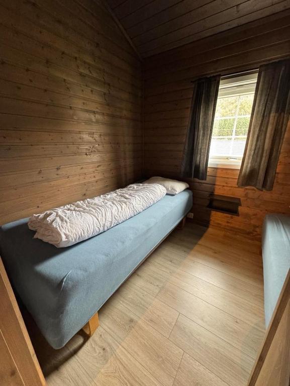 Postel nebo postele na pokoji v ubytování Skottneset Feriesenter