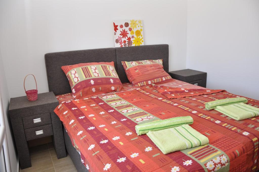Postel nebo postele na pokoji v ubytování Apart Hotel S Lux