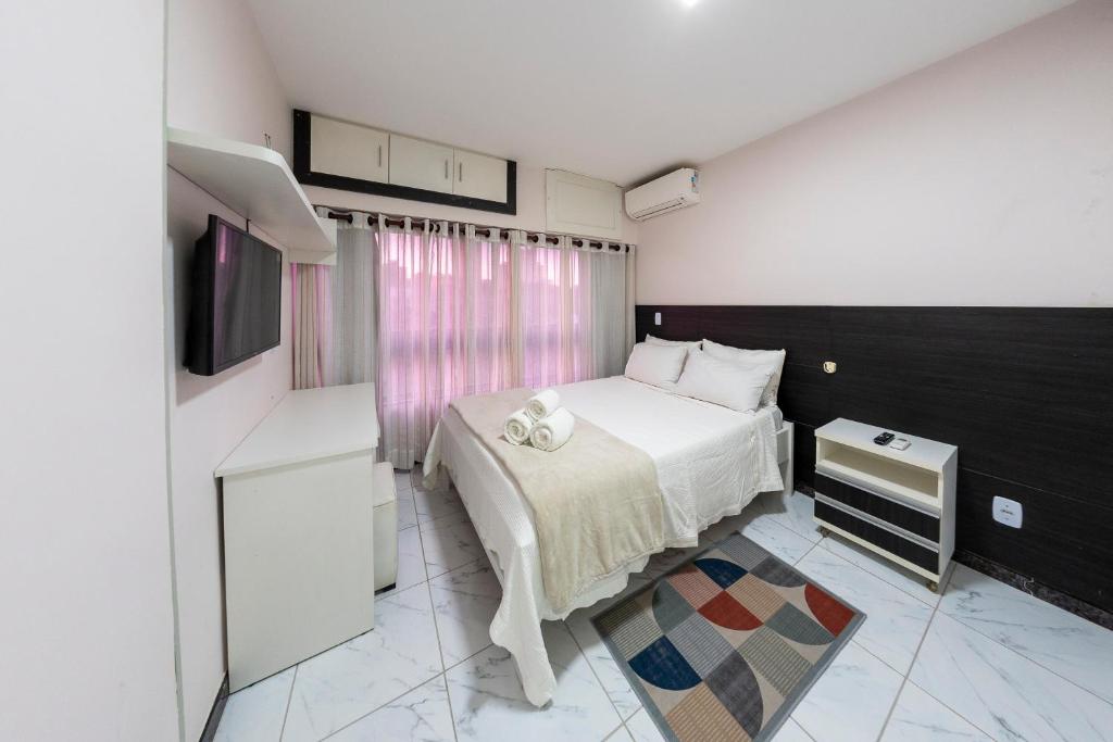 Postel nebo postele na pokoji v ubytování Ondina Apart Hotel