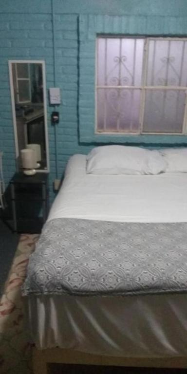 Postel nebo postele na pokoji v ubytování Casa cupo 52 pax 18 habs en Centro de Sayulita especial para bodas intimas