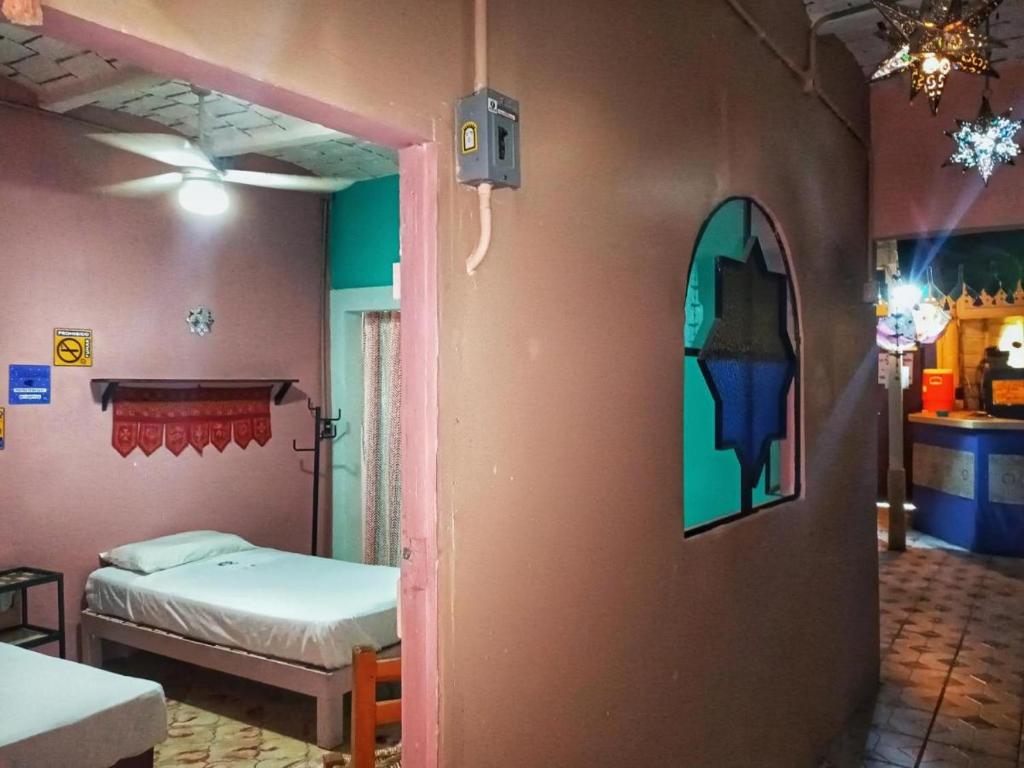 Postel nebo postele na pokoji v ubytování Casa cupo 52 pax 18 habs en Centro de Sayulita especial para bodas intimas