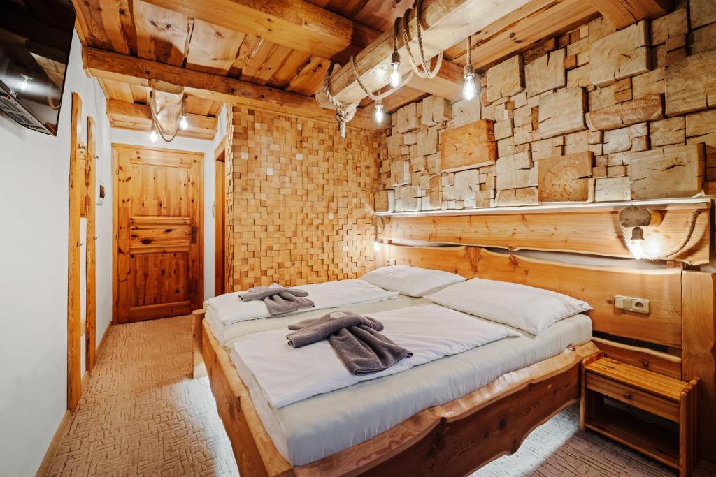 Letto o letti in una camera di Ranč Podlesok