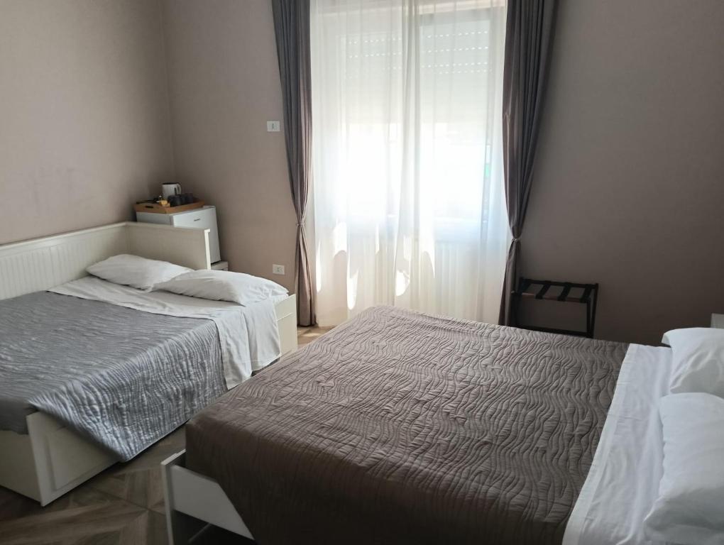 Postel nebo postele na pokoji v ubytování civico 250