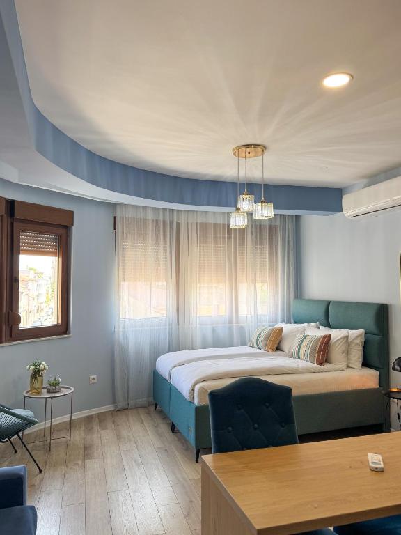 Postel nebo postele na pokoji v ubytování Urban Residence Apartments