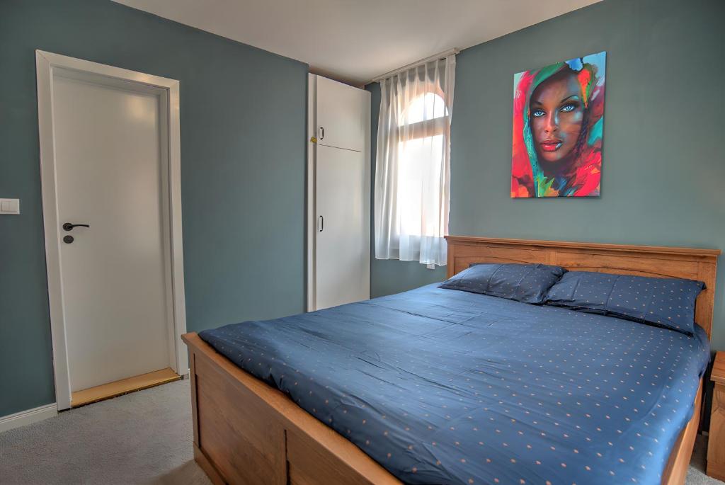 Postel nebo postele na pokoji v ubytování Villa Carpe Diem