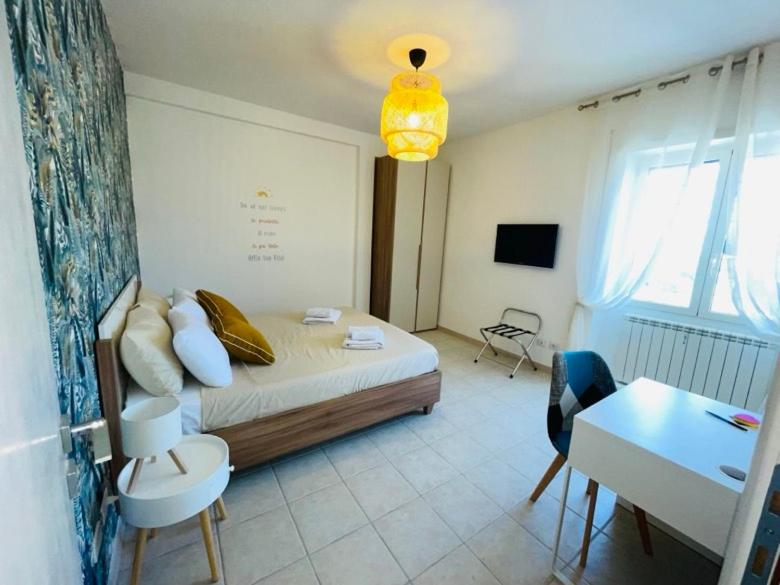 Postel nebo postele na pokoji v ubytování A casa di Alessio